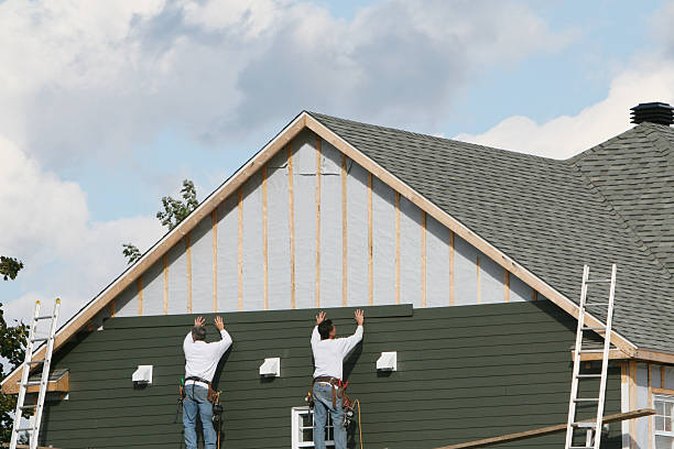 Professional Emergency Siding Repair technician working in Ashville, PA